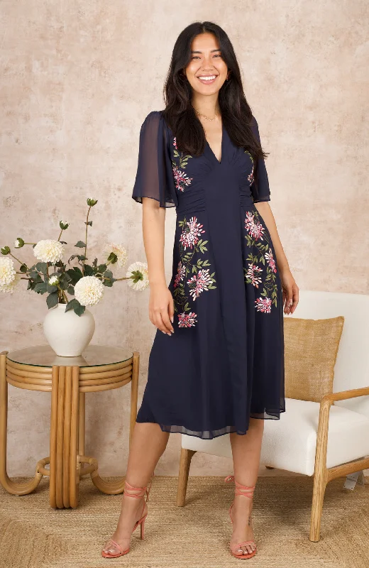 The Tiffany Embroidered Flutter Sleeve Front Panel Dress (Navy)